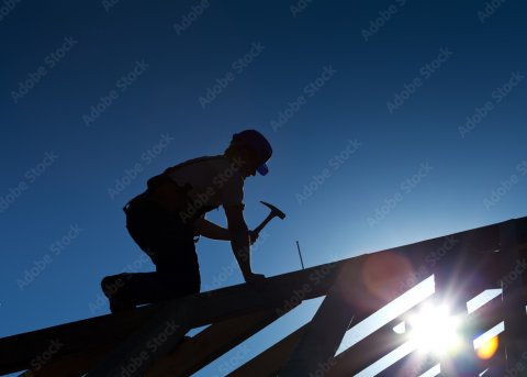 roofer with hammer